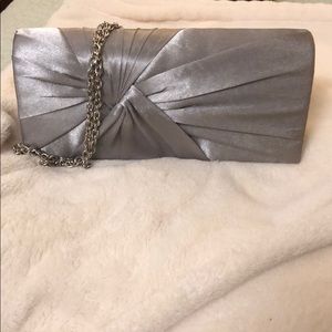 Like new silver clutch